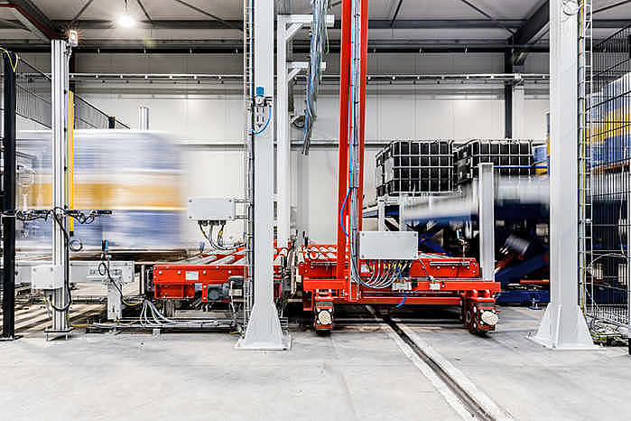 Verteilung von Fässern auf Verfahrwagen